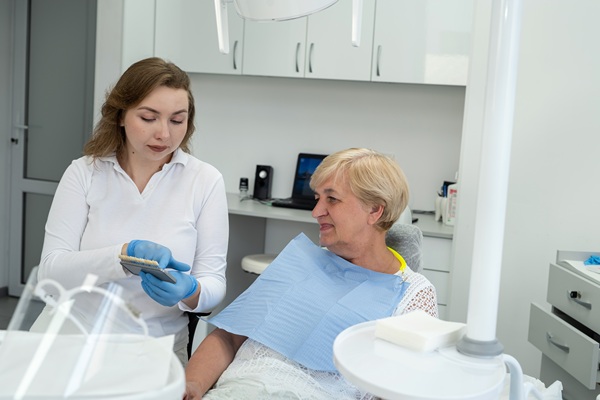 How Denture Adjustments Can Help With Sore Spots